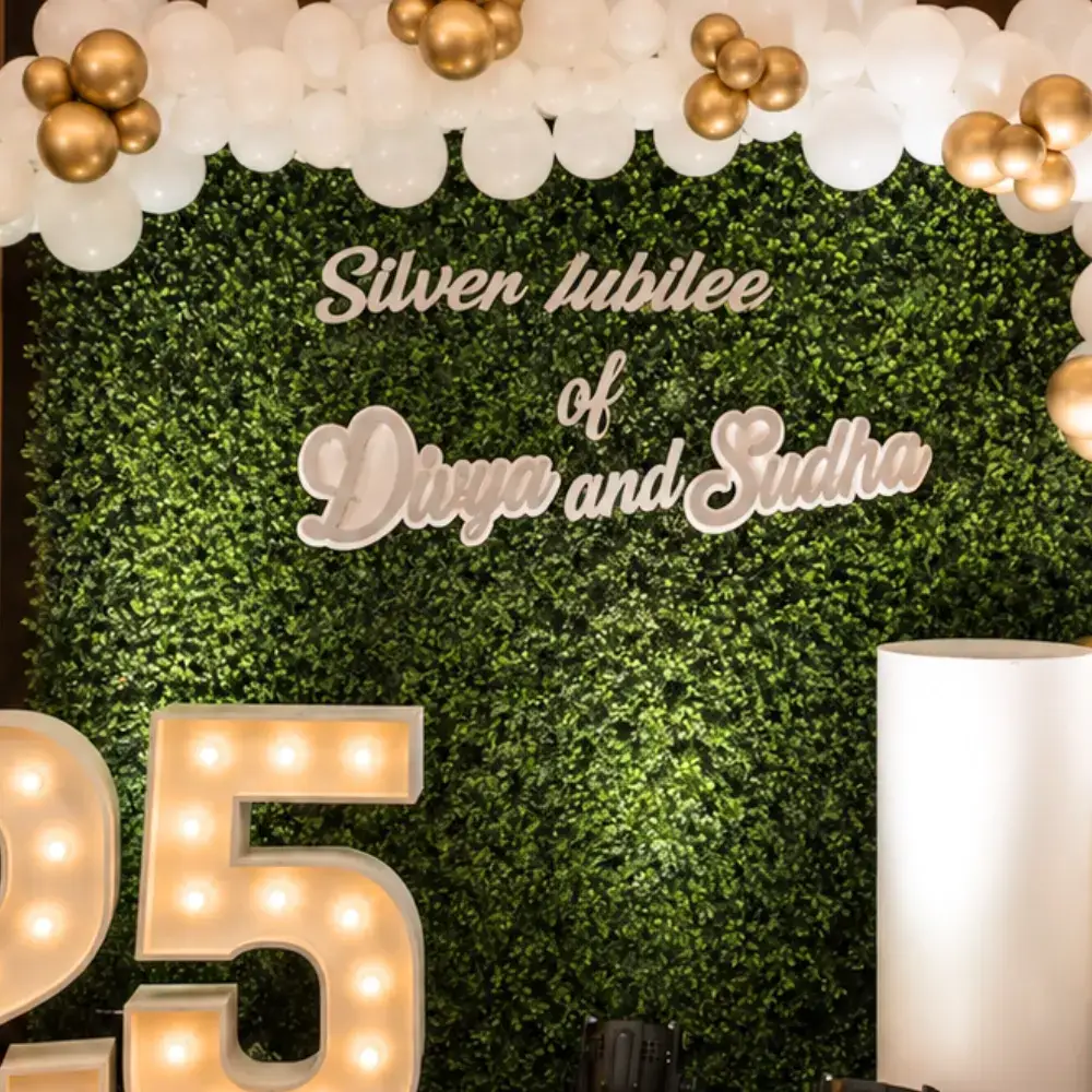 Anniversary Stage Decoration with customized name on backdrop — photo 2