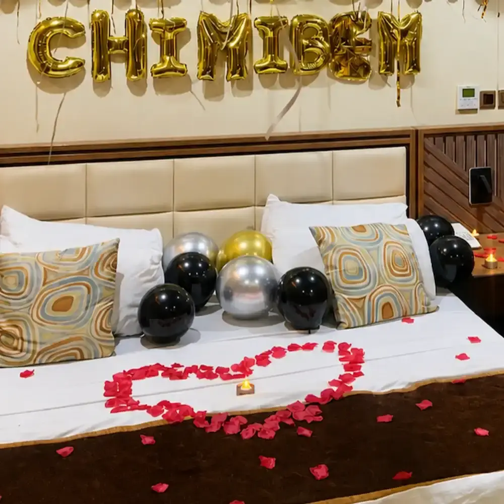 Romantic Anniversary Room Decoration with 50 balloons on ceiling — photo 2
