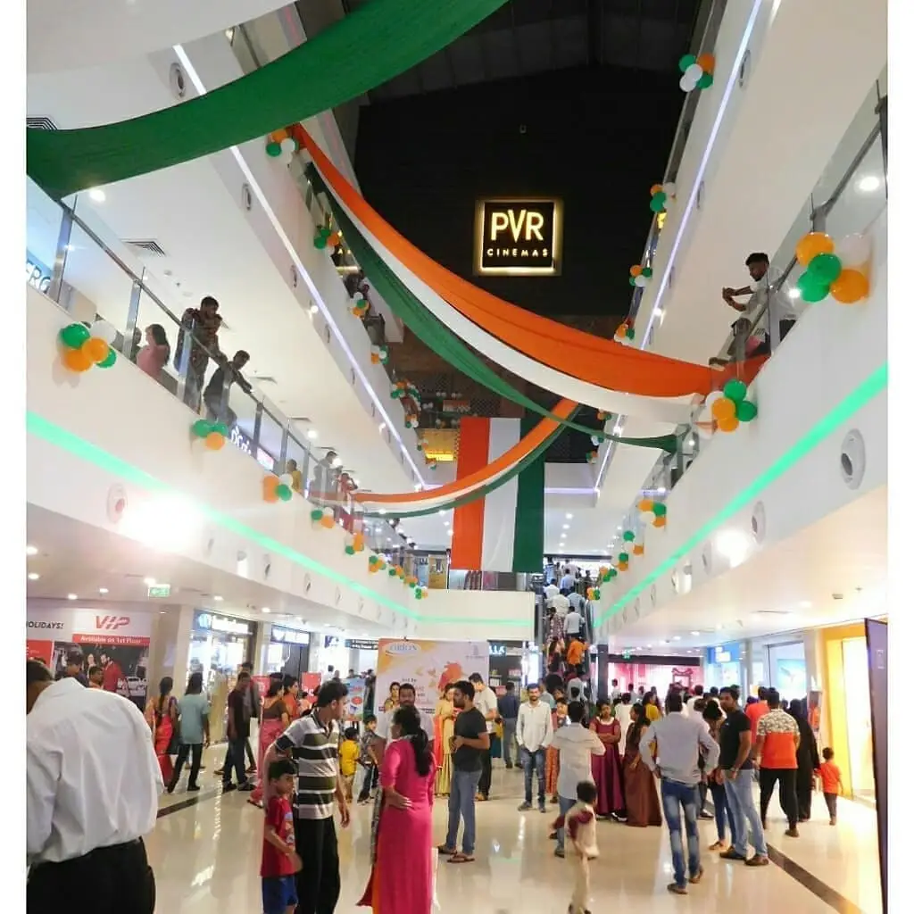 Office workstation decorated with tricolour balloons for Independence Day